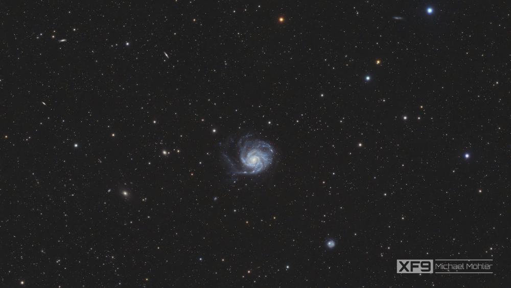 An image of M101, a beautiful spiral galaxy. One can clearly see it's spiral arms.