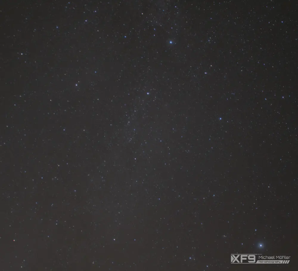 A star field with its brightest stars resembling a cross - the constellation of cygnus